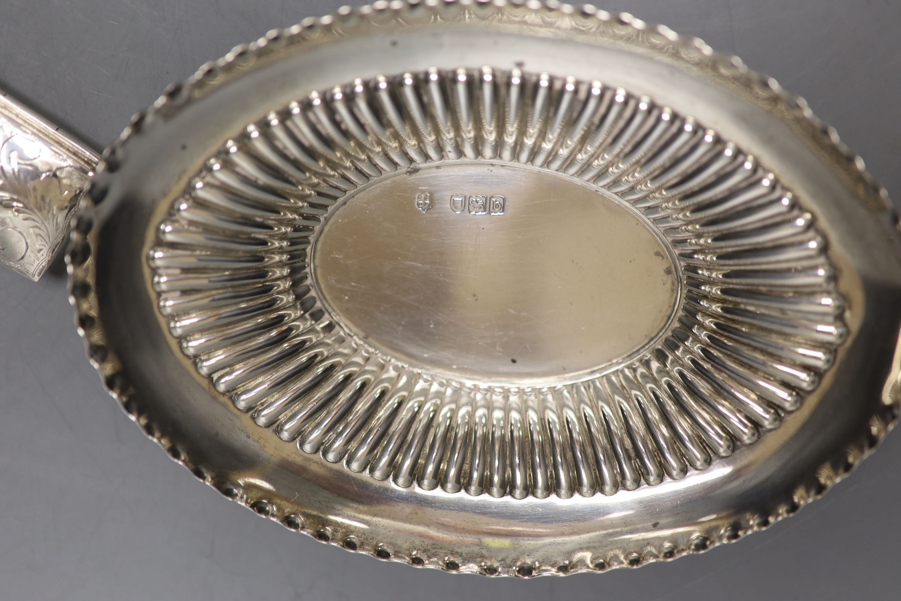 A late Victorian demi-fluted oval dish, London, 1897, 15.2cm, a silver handled paper knife & 5 boxers.